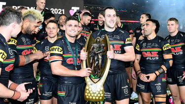 Nathan Cleary and Isaah Yeo with the premiership trophy.