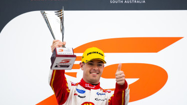 Supercharged: Scott McLaughlin of the Shell V-Power Racing Team Ford Mustang celebrates sealing a historic title win after the Supersprint round at The Bend Motorsport Park in South Australia. 