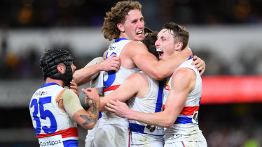 The Bulldogs celebrate a win for the ages.