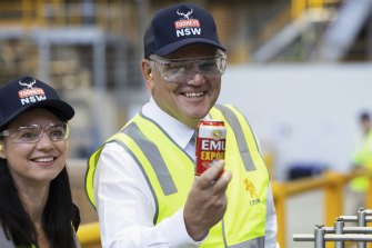 Scott Morrison comfortable standing out in high-vis gear on the campaign trail.