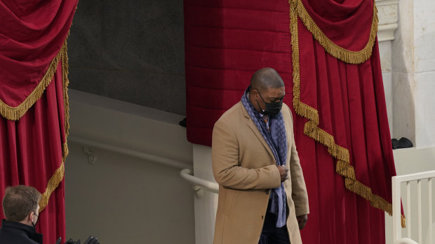 US Capitol police officer Eugene Goodman arrives for the inauguration .