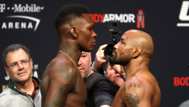 Israel Adesanya faces Yoel Romero during the weigh-in for UFC 248 in Las Vegas.