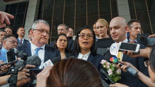 From left, Allan McKinnon, Australian ambassador designate for Thailand, Araibi's lawyer Nadthasiri Bergman and other foreign diplomats address the media after the extradition hearing for Hakeem Al-Araibi on Monday.