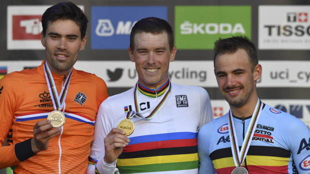 World champion Rohan Dennis (centre), with runner-up Tom Dumoulin (left) and bronze medallist Victor Campenaerts.