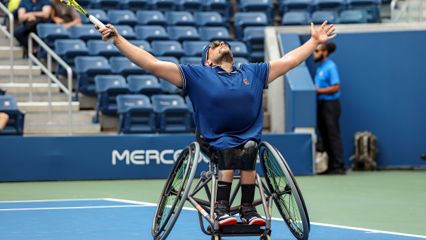 Dylan Alcott celebrates winning championship point against Niels Vink of the Netherlands in their US Open wheelchair quad singles final match. 