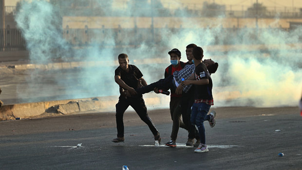 A protester is injured during the demonstration as the number of people killed by police rises to at least 91.