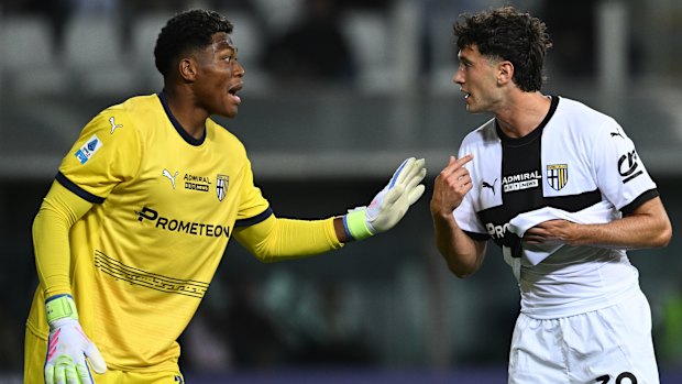 Alessandro Circati with Parma goalkeeper Zion Suzuki.