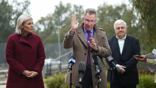 Albury mayor Kevin Mack (centre) when the border checkpoint was set up in July. 