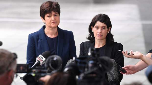 Sarah Atkinson from Maurice Blackburn Lawyers (left) and Katie Robertson from the Human Rights Law Centre speak  to media outside the Brisbane magistrates court in Brisbane on Monday.