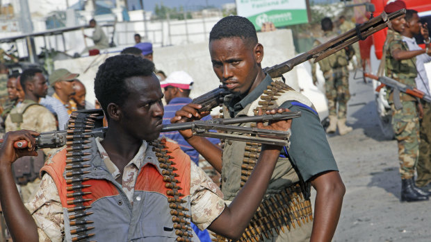 Somali soldiers secure the scene of a car bomb explosion  in Mogadishu in June.
