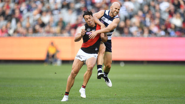Cat attack: Geelong’s Gary Ablett catches Bomber Dylan Shiel high during the Cats’ comfortable victory at the MCG yesterday.