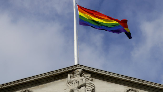 The rainbow flag flies above the Bank of England to celebrate the unveiling of the new fifty pound note.