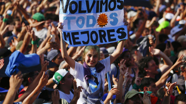 Supporters of Alberto Fernandez celebrate his inauguration as president outside the presidential palace in Buenos Aires.