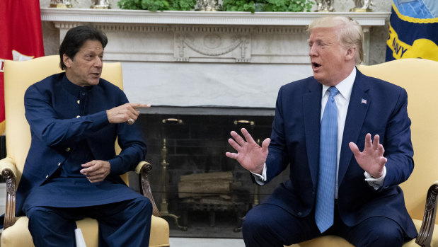 US President Donald Trump told Pakistani PM Imran Khan, left, he could solve the Kashmir conflict and the war in Afghanistan "in 10 days". India denied it has asked for help with mediation.