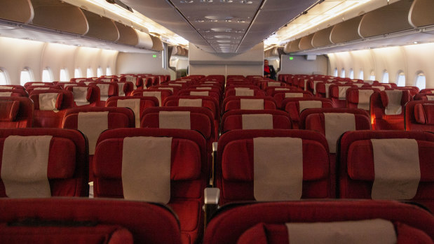 A public health crisis: an empty flight from London's Heathrow Airport.