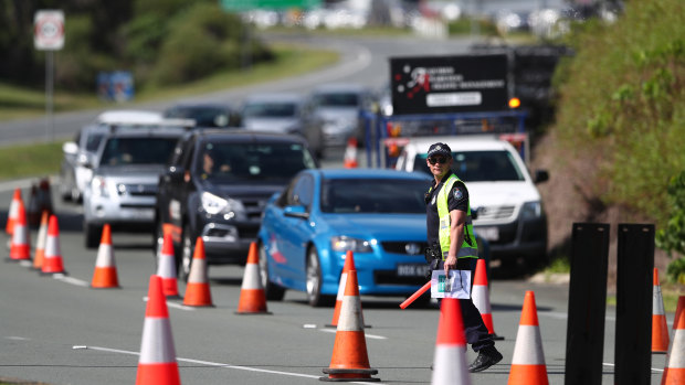 Police checks for border passes continue to cause traffic delays. 