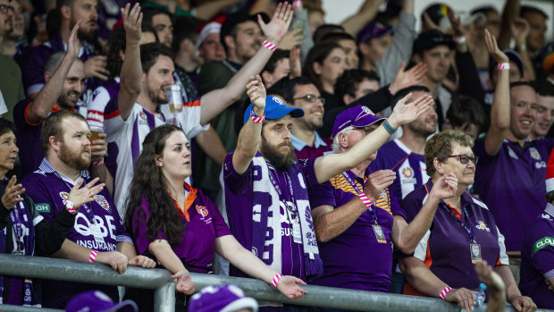 Purple patch: Perth fans show their support in the 'Shed' at nib Stadium.