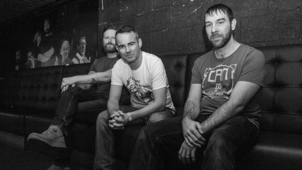 Mclusky's Andy Falkous (centre) is rapt to have the band back on the road.