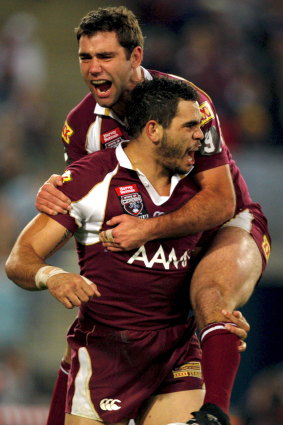 Next in line: Will Inglis take over as Maroons captain from Cameron Smith, here celebrating in 2009.