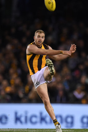 Pole position: Tom Mitchell racked up nine points against Fremantle to move into first place.