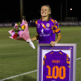 Rigby celebrating her 100th game in 2023.