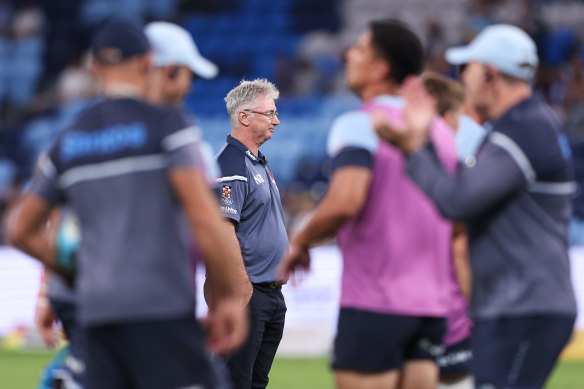 Darren Coleman looking on as the Waratahs warm up.