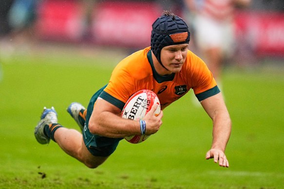 Australia's Josh Flook scores a try during the rugby test between the Wallabies and Japan.
