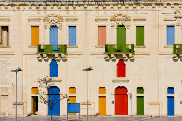 A bright harbour building in among the walkable streets of Valletta.