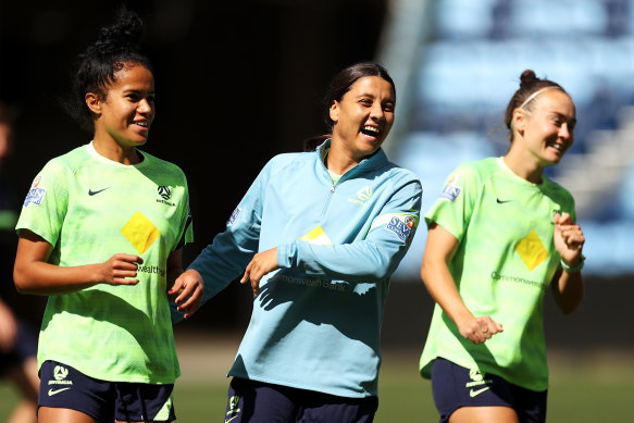 Mary Fowler, Sam Kerr and Caitlin Foord share a laugh at training.