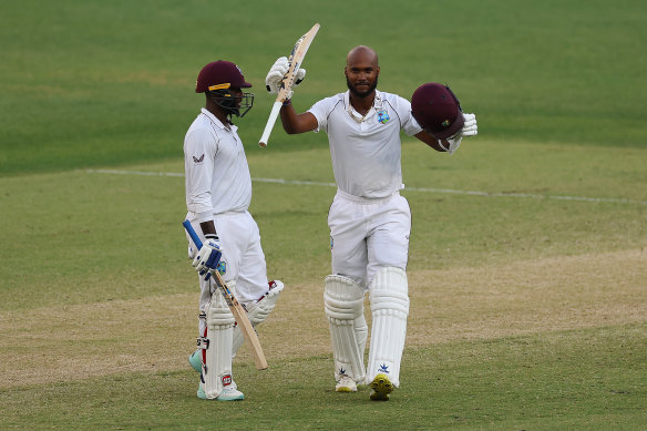 Kraigg Brathwaite raises his bat after posting a century during the Perth Test last summer.