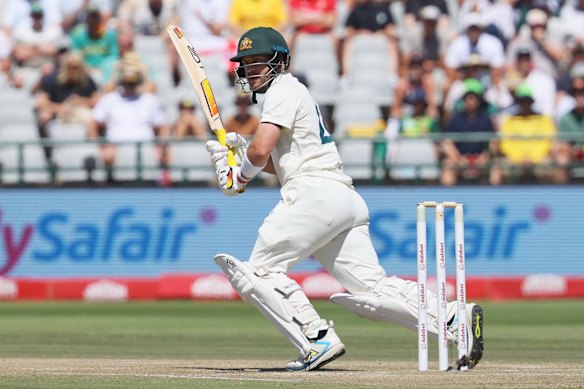 Australia’s batsman Josh Inglis watches his shot on day three.