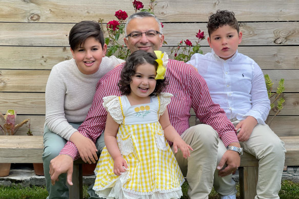 The El Nabbout children with their father on Saturday.
