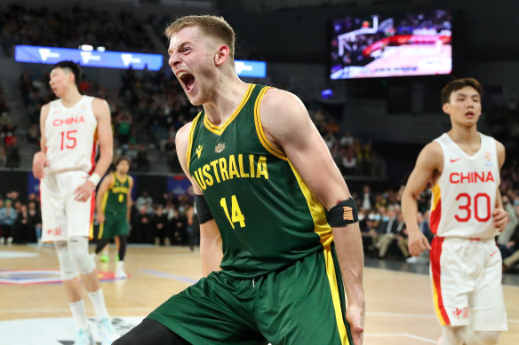 Jack White celebrates a dunk against China.