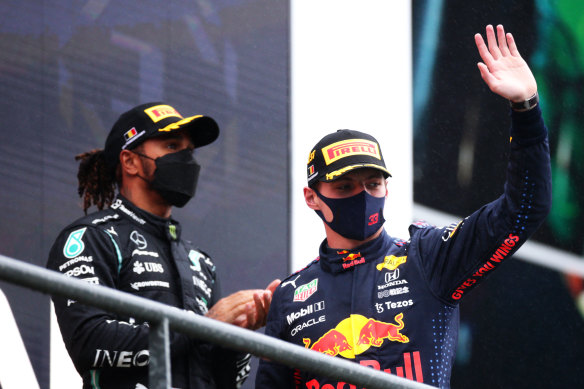 Max Verstappen and Lewis Hamilton on the podium after the Belgian Grand Prix.