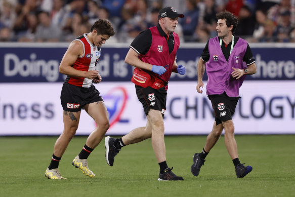 Liam Stocker was penalised for taking out Dangerfield’s legs, and was hurt in the process.