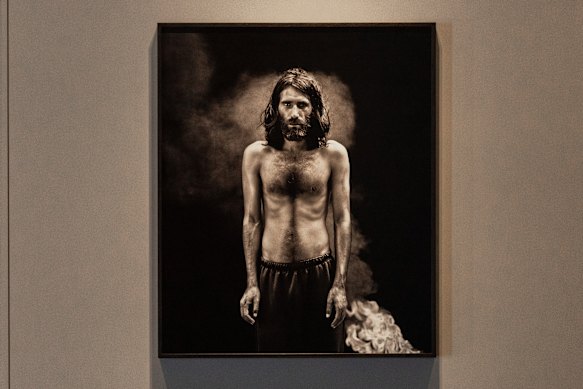 Portrait of Kurdish-Iranian journalist Behrouz Boochani by Hoda Afshar, on display at Buxton Contemporary. 