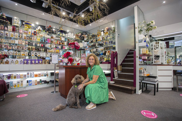 Abbie Siegel and Buddy in her perfume and beauty salon Paint n Powder, the longest running in the Royal Arcade.