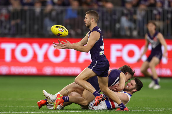 Sam Switkowski intercepts a loose ball during the elimination final against the Western Bulldogs on Saturday.