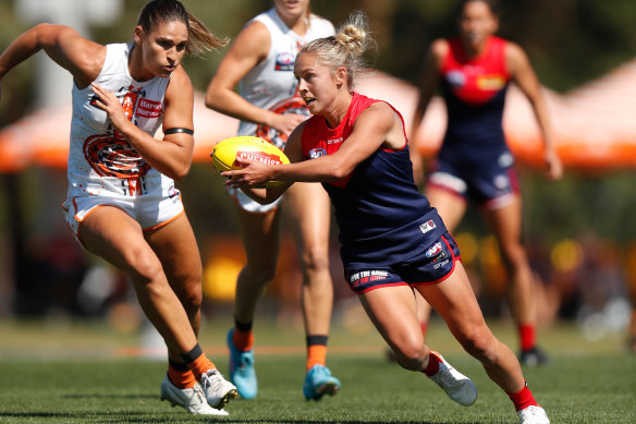Tyla Hanks (right) will be a crucial midfield cog for the Demons in their grand final this weekend against Adelaide.