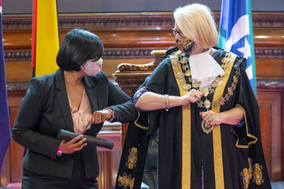 Councillor Roshena Campbell with lord mayor Sally Capp at a swearing in ceremony last November.