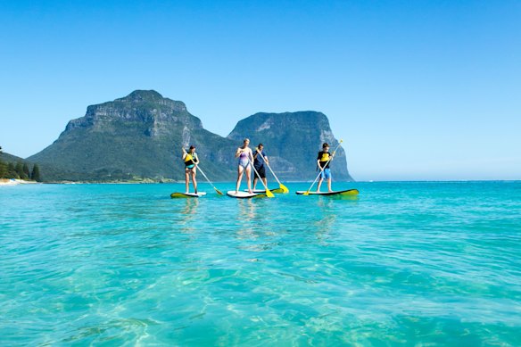 Paddling off Lagoon Beach, Lord Howe Island.