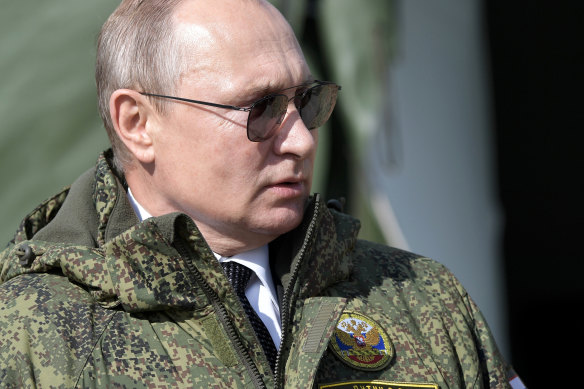 Vladimir Putin watches military exercises in 2019.