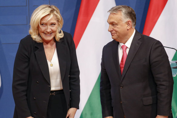 French far-right leader Marine Le Pen, left, with Hungarian Prime Minister Viktor Orban.