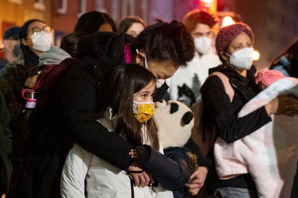 Community members gather for a vigil to mourn and confront the rising violence against Asian Americans in Philadelphia, after the attacks in Atlanta.