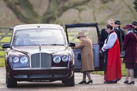 Queen Elizabeth II leaves after attending a morning church service at St Mary Magdalene Church in Sandringham, England one day before the meeting. 