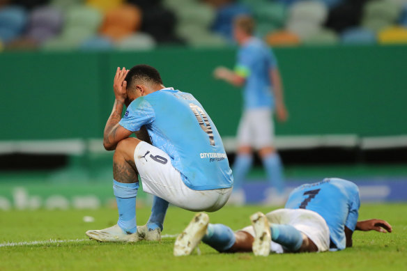 Dejected City pair Gabriel Jesus and Raheem Sterling after the loss to Lyon.
