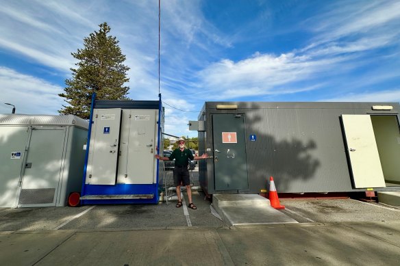 Fremantle resident and South Beach regular Ian Ker in front of the temporary changing and toilet facilities.