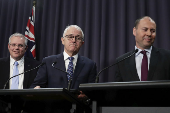 Then Treasurer Scott Morrison watches on as Malcolm Turnbull and Josh Frydenberg address the media on August 20, 2018. Within days, Turnbull would be deposed and Morrison would be PM. 