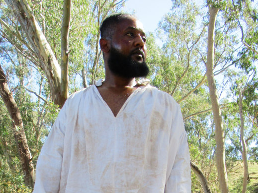 Actor Mohamed Osman playing black African bushranger John Caesar in the documentary.