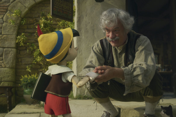 Pinocchio (voiced by Benjamin Evan Ainsworth) and Tom Hanks as Geppetto. 